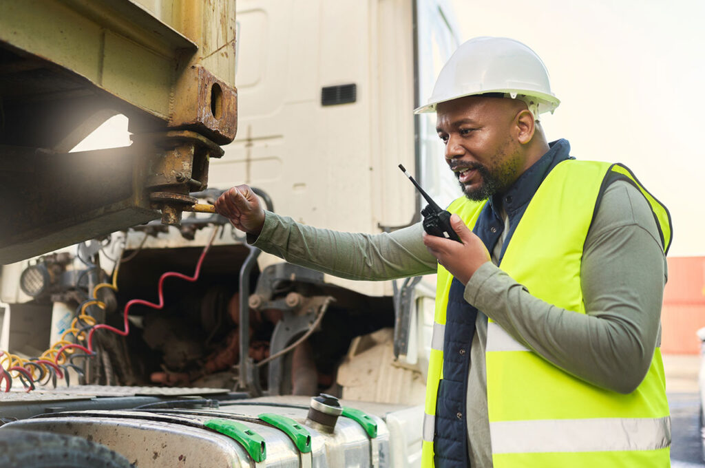 a distribution partner conducting tests on a vehicle used for outsourcing distribution