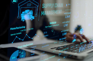 a distribution manager exploring supply chain strategy on a laptop